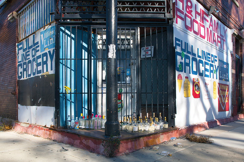 Liquor bottle street memorial. 