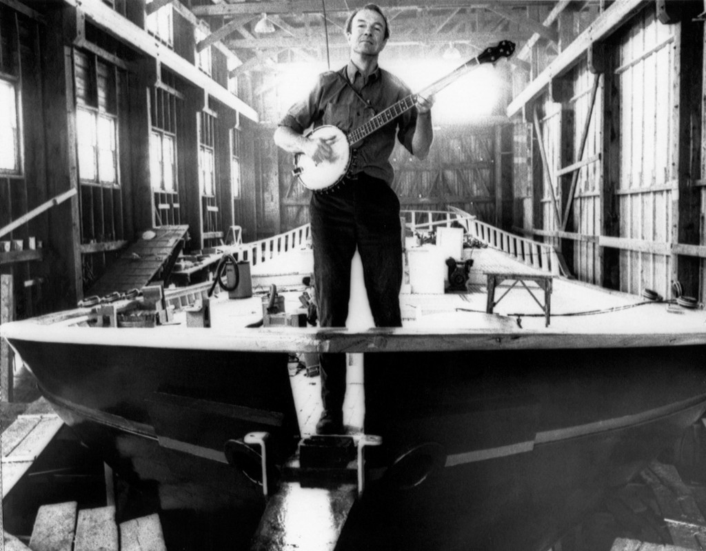 Pete Seeger atop the sloop Clearwater, which he used to promote the environmental cleanup of the Hudson River, along which he lived for many years in Beacon, NY (photo: AP)