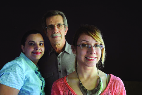 Veronica Jimenez, with her parents, in a photo that ran in the Chicago Sun-Times in May.