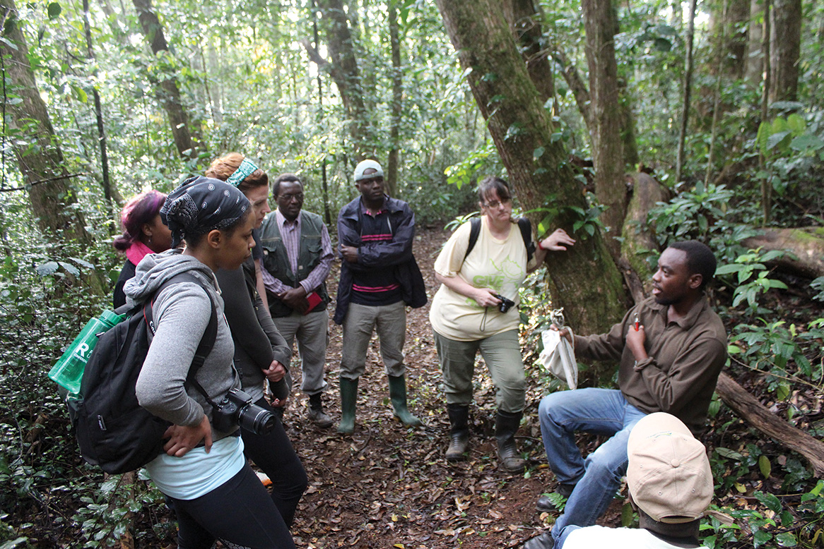 Emmanuel Mgimwa of BirdLife Tanzania demonstrates how to tag a bird for field study