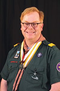 Ken King portrait in boy scout uniform