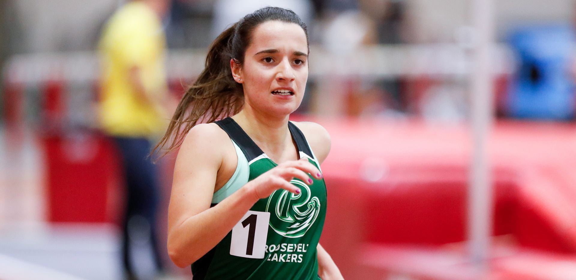 Roosevelt student-athlete Gina Narcisi runs on the track.