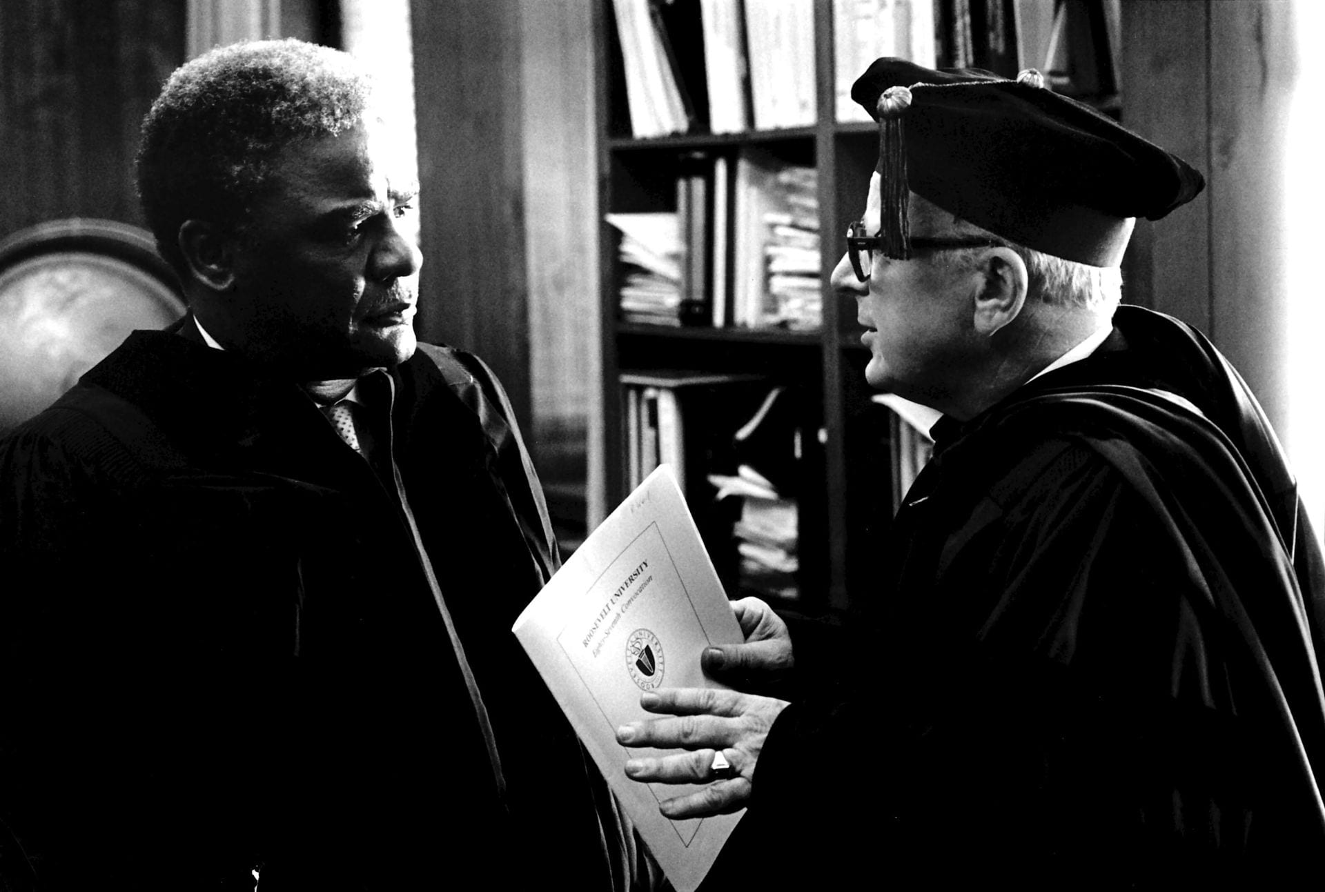 Harold Washington in conversation with Roosevelt President Rolf Weil at the University Commencement Ceremony.